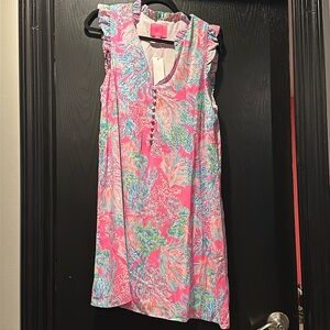 Ruffle sleeve calls soft shift dress